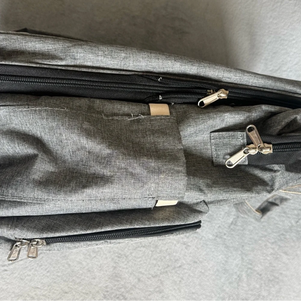 Gray Baby Backpack/Diaper Bag with fold out portable bassinet